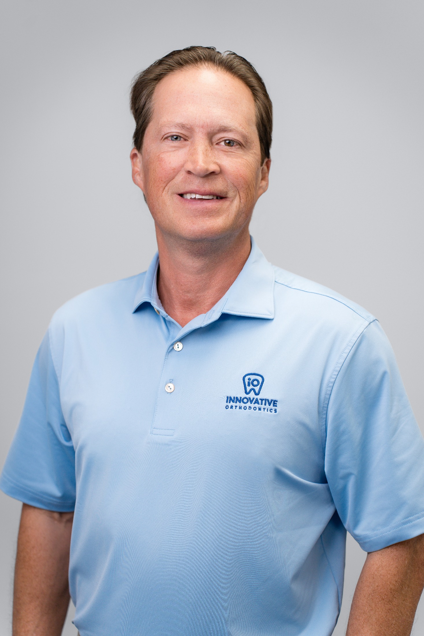Dr. Donihue Waters, orthodontist at Innovative Orthodontics, smiling portrait.